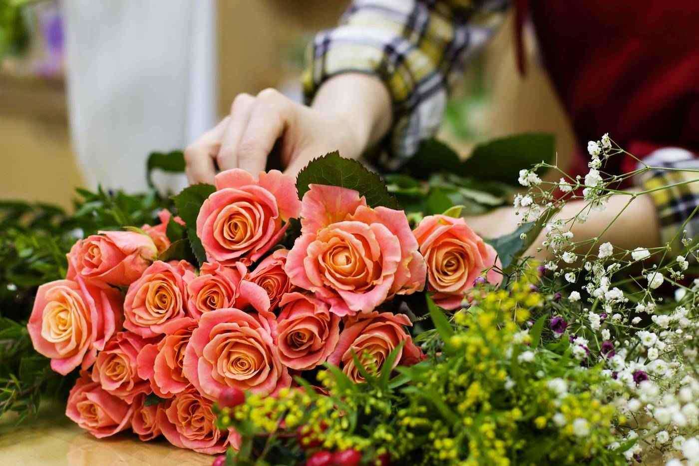 Person working with flowers